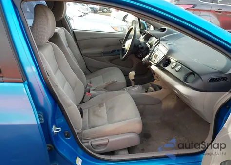 2010 Honda Insight Lx from USA, damaged, VIN JHMZE2H50AS034660